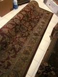 Room size rug ... burgundy, greens, beiges ... machine made