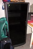 Black stereo cabinet, glass door