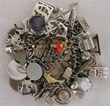 Charm Bracelet with Tons of Charms, mostly Sterling Silver