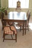 Dining Room Table with leaves, 2 arm chairs and 4 side chairs