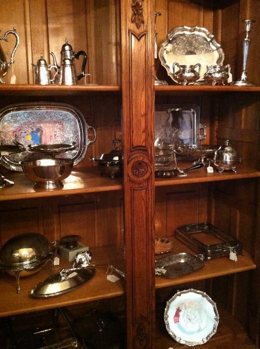     armoire full of  silver plate & sterling serving pieces