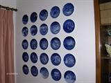 Blue & White Plates (lots of them hanging in this house) from B&G, Royal Copenhagen, Hallmark & more.