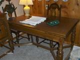 Dining Room Table with pullout end leaves.  Table also has 6 chairs that match.
