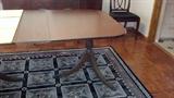 Clawfoot table with 3 leaves and 8 chairs. 