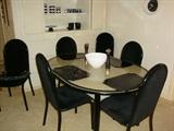 BEAUTIFUL DINETTE SET WITH 6 LOVELY BLACK SUEDE CHAIRS - TABLE EXTENDS.