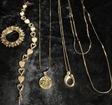 A few 14kt Gold pieces of Jewelry, Pearl Brooch, Heart Bracelet, USA Flag/Eagle Coin, 14kt Yellow Gold Kaynar Russell Mother and Child Pendant on Box Chain. 30" 14kt Gold Chain