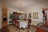 Beautiful Fairmount Designs Cherry Dining Room Suite: Dining table w/2 Arm Chairs & 4 Side Chair with a Large Lighted China Cabinet and a Miresco Hand Knotted Renaissance 6x9 Rug