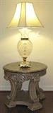 Aico Crackle Round Marble Top Ocassional Table shown with a large Crystal Lamp