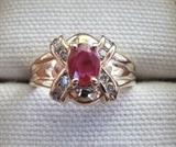 14 Carat Gold Ruby and Diamond Ring. There is also a Diamonds International Ruby & Diamond Braclet.