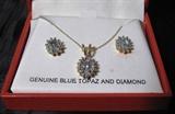 Blue Topaz and Diamond Pendant Necklace & Pierced Earring in Gold over Sterling