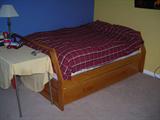 this is the trundle bed that has a bunk that fits on top and another bed that pulls out!