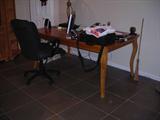 this is the table that matches the chairs and hutch in one of the first pictures. Also, please note that items on the table are NOT for sale