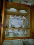 Second cabinet filled with Norleans Bridal Rose China