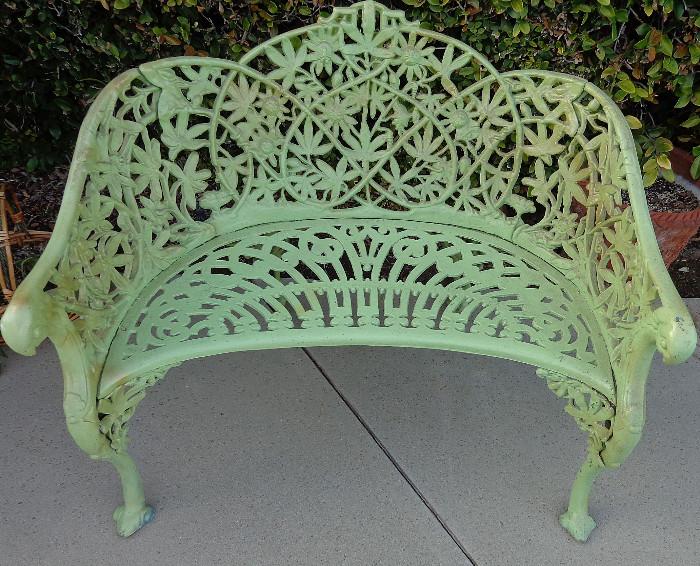 one of two iron benches