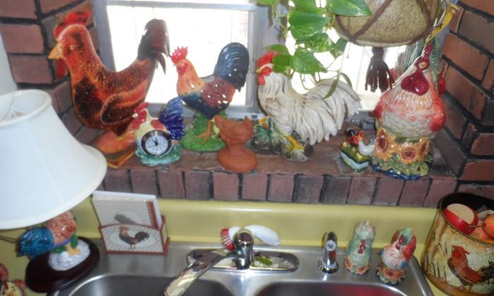 Rooster collection. Cookie jar, vintage Rooster, wall hook, clock, lamp, note holder, and more.