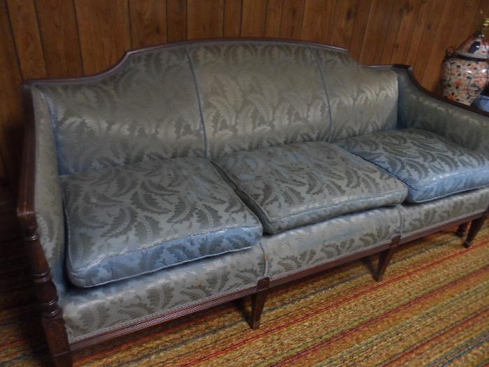Looks what's under the blue cover! An antique couch.