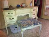 Vintage French Provincial-style vanity table and stool. Center of vanity opens for mirror.