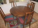 Breakfast room table and chairs plus nice rug