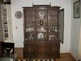 China Cabinet full of silver, crystal, china and much misc.