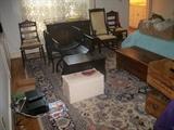 Lots of misc furniture;  Nice room size oriental