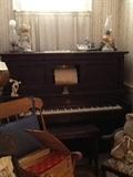 Player piano with sheet music rolls!
