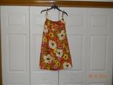 The “IT” Boutique. San Juan. Retro, floral Hibiscus print, spaghetti strap sun dress.
Size appears to be small to medium. Metal zipper. Feels like cotton.