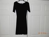 “Betsy Johnson” black stretch knit flare dress. Petite.