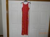 Vibrant orange and purple cotton tint dress with side slits.
Smaller size - assume small or extra small. Unlabeled. Full length.