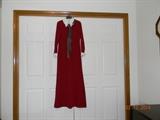 “Lansford” sweater dress. Long, maroon red with white collar and cuffs.
Brown and white polk dot scarf. No size is indicated.
Dress appears to be medium size. Good condition.