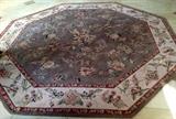 Octagonal wool floral rug