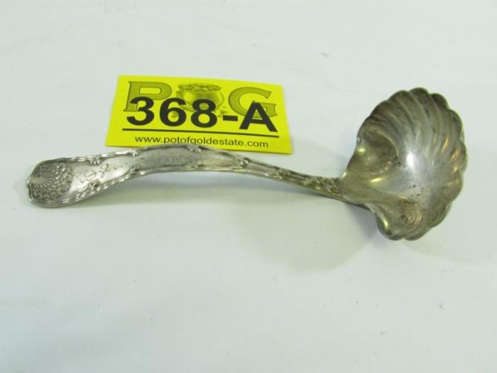 Lot#:	368a
Description:	Vtg Tiffany & Co Sterling Wave Edge Serving Ladle
Gorgeous vintage Sterling silver flatware cutlery sauce / gravy serving ladle. Manufactured by luxury jeweler Tiffany & Co., this piece of tableware is in the now discontinued “Wave Edge” pattern which ran from 1884 – 1955 and designed by Charles Grosjean. This double sided pattern features an intricate triple scallop shell on the end with wavy lengths of seaweed running up the entire length and a shell shaped bowl. It is monogrammed on the end but it is so stylized it almost appears as part of the pattern. Marked on the underside “Tiffany & Co. Sterling”. In great condition with light tarnish; but no visible dings or dents! Measures 6.75” long.
Total Weight: 2.48 ozt
Tag Words: Sterl925, T&CO, Tiffany’s, TIF, 925
For more Tiffany see lots # 9, 179a, 236a