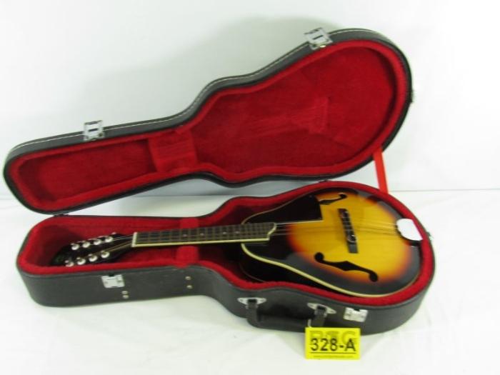 Lot#:	328a
Description:	Vintage A-Style Samick Mandolin w/ Case
Gorgeous vintage A style, pear shaped Samick Mandolin! Well maintained and in superb condition, it features a spruce top, maple back sides and neck. This is a great instrument for any type of player; is strung and ready to play. Presented and protected in a black hard case lined with red felt interior. In excellent condition; could use some tuning and re-strung. Specs include:
- Symmetrical pear-shaped body.
- F-holes.
- four-per-side tuner pegs. 
- Bound top, back, fingerboard, in an off-white cream color. 
- Tobacco sunburst lacquer finish. 
- Rosewood fingerboard inlaid with 4 mother of pearl dot inlays. 
- Adjustable rosewood bridge 
- Nickel silver hardware
Tag words: chordophone, music, mandola, lute, balalaika
Look throughout the auction for other musical instruments!
