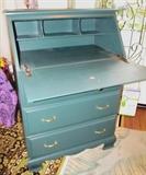 Nice Drop Front Writing Desk with drop front writing surface and storage, 3 drawers storage, brass pulls, bracket style feet and teal green color finish