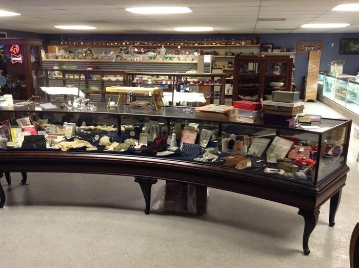Antique curved show cases. 