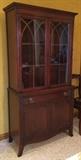 Antique Duncan Phyfe style cherry wood china cabinet in very good condition.