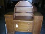 Dresser with Oval Shelving on Top