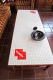Reto tile top table with large single drawer on one end