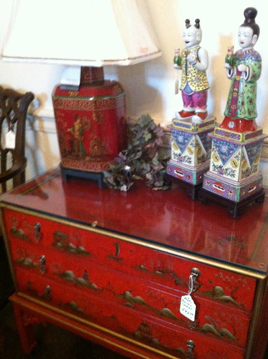             red Oriental chest & lamp; porcelain statues