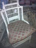                     white wicker chair with cushion
