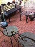                  patio furniture, planter, and yard art