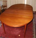 Very nice teak dining table. 8'x 4', with both leaves in place, as shown here. Very light wear. Stunning piece