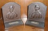 Bronze bookends featuring Whittier and Holmes in relief
