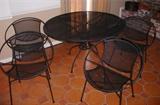 Wrought iron table and chairs, cushions included but not pictured