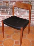 A single J.L. Moller chair, which needs recovering