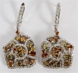 Lot#2067, 4.50CT FANCY COLOR DIAMOND DANGLE EARRINGS, PAIR, L 1 1/4"14kt white gold dangle earrings, featuring 4.50 carats of oval and round natural fancy color diamonds, with 1.50 carats of white round side diamonds. They measure L. 1 1/4", with a total approximate weight of 11.1 grams.