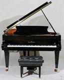Lot#2158, SCHIMMEL BLACK EBONY ANNIVERSARY EDITION GRAND PIANO, 6' 10"#310812. Schimmel is a German piano maker. The company was founded in 1885 in Leipzig by Wilhelm Schimmel. This company is especially popular for its high quality concert grand pianos.