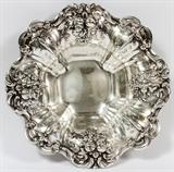 Lot#1022, REED & BARTON 'FRANCIS I' STERLING BOWL, 1953, DIA 11.5"Sterling silver bowl with repousse fruit and nut boughs about the rim, stamped at the underside, number X569 and date mark for 1953 (see additional photo). Measures H.2 1/4" x 11 1/2" x 11 1/4". Weighs approximately 20.6 troy oz.