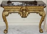 Lot#1045, ITALIAN GILT WOOD CONSOLE WITH MARBLE TOP, H 32", W 43", D 19"A carved mask centers the frieze, raised on cabriole legs ending in claw-and-ball feet.  Measures H.31 1/2" x 43 1/2" x 19".