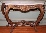 Lot#1046, LOUIS XV STYLE GILT WOOD CONSOLE WITH MARBLE TOP, 19TH C., H 34 1/2", W 50", D 17"Serpentine top above a pierced frieze, raised on cabriole legs joined by a stretcher.