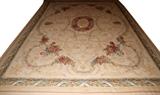Lot#1057, AUBUSSON STYLE CARPET, 15' 2" X 10' 10"Having a light ground with a central floral medallion and overall flower and vine design.